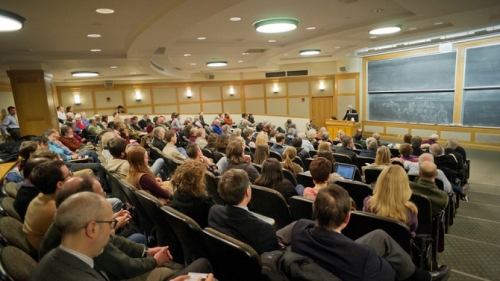 An audience listens to a speaker at the 2018 Summar Seminar for Composition